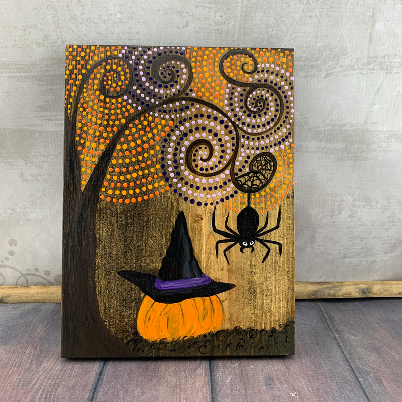 Tree art with spiders and pumpkins