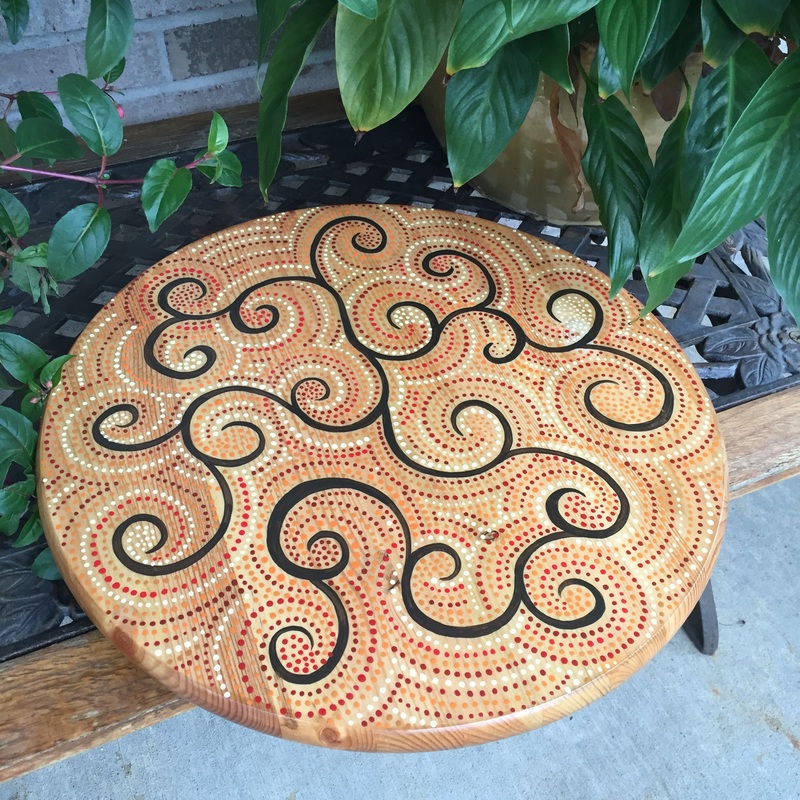 Hand painted dot art on a lazy susan